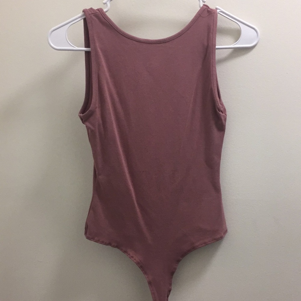 brand new bodysuit from fashion nova.